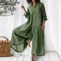 Detail view of a loose-fitting olive green long sleeve linen jumpsuit for women. - S / Top And Bottom (736) / Green