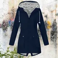 Detail of navy blue women's hooded raincoat with striped lining and large pockets - S / Top (Split Hem Style) / Navy Blue