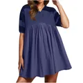 Detailed view of the polo collar, button placket, and gathered waist on a navy blue dress - Purple