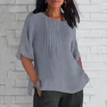Detail of gray pleated cotton linen blouse featuring a round neck and casual style - Gray