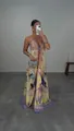 Full-length view of a Bohemian floral halter maxi dress with deep V-neck design - XS / Dresses / Yellow Mandala Print