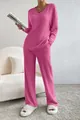 Stylish pink ribbed knit two-piece lounge set featuring a V-neck top and straight-leg pants - Rose Red
