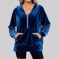 Detailed macro view showing the soft texture of a blue velvet half-zip hoodie with pocket - Sapphire Blue