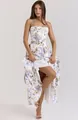 Close-up detail of an elegant white floral corset maxi dress with lavender prints - S / Bottoms / White Floral