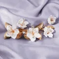 Elegant forest style bridal hair clip with white ceramic flowers and gold leaf accents - White Flower Gold Leaf (HS-J7445G)