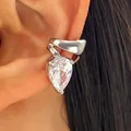 Elegant silver-tone ear cuff with twisted lines and a pear-shaped cubic zirconia stone. - Left Ear (1 Piece) / Silver