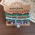 Detail view of vintage bohemian beaded bracelet set with sun and feather charms. - Bowknot Theme (6-Piece Set) / One Size / Silver-Green-Blue