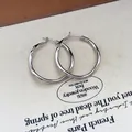 Minimalist silver round hoop earrings featuring a polished finish and silver needle design - 4cm (92#) / Silver