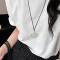 Minimalistische zilverkleurige holle hart hanger ketting met zwart koord - Hol Hart-Zilver-Zwart Koord