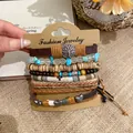 Detailed view of bohemian multi-layer bracelet set with tree of life and heart charms - Brown Small Tree