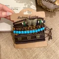 Close-up of ethnic vintage bracelet set with leather, wood beads, and butterfly charm - Brown Blue Butterfly / 6-Piece Set