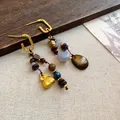 Boucles d'oreilles asymétriques vintage avec perles mixtes et breloque cœur doré - Crochets d'Oreilles à Glands en Perles de Bois Ethniques Asymétriques (59#) / Brun doré