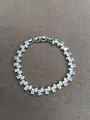 Elegantes silberfarbenes Tennisarmband mit oval geschliffenen Zirkoniasteinen für Damen - Silber-Weiß