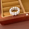 Κομψό δαχτυλίδι με διπλή σειρά μαργαριτάρια και ζιργκόν σε ξύλινη κοσμηματοθήκη - Πολυτελές Δαχτυλίδι με Διπλή Σειρά Μαργαριταριών (50#)