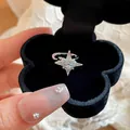 Elegant dainty cubic zirconia star-shaped ear cuff earring presented in a black velvet gift box - Heart Blue Main Stone Single Piece