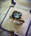 Close-up of vintage gold alloy ring set with emerald-green cushion-cut cubic zirconia - Size 6 / Gold Green Cushion Cut Style (CY738)