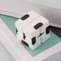 Infinity cube fidget toy in white and black, stress relief sensory gadget for adults - Box Packaging / White