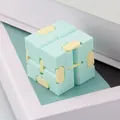 Mint green macaron infinity cube fidget toy for adult stress relief and office fun - Box Packaging / Light Green