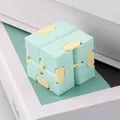 Mint green macaron infinity cube fidget toy for adult stress relief and office fun - Box Packaging / Light Green