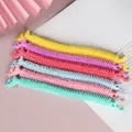 Close-up macro view of colorful unicorn stretchy TPR noodle toys for sensory stress relief - 20cm 13.5g / Unicorn Bracelet Mixed Colors