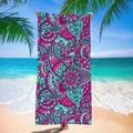 Full view of a vibrant mandala patterned microfiber quick-dry beach towel on a sunny beach - Rose Pink & Cyan Mandala Pattern (8) / 120x60cm