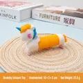 Creative unicorn pop tube fidget toy with orange telescopic body for stress relief - Unicorn