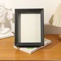 Élégant cadre de boîte d'ombre en bois noir avec une profondeur de 2 cm pour l'art 3D - Style Biseauté / A4 (21x29,7cm) Sur Table / Noir