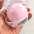 Handgefertigtes rosa knuspriges Quetschspielzeug in transparenter Kapsel zum Stressabbau - Pfirsich Knuspriger Stil / 1 Stück