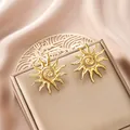 Elegant irregular sunburst stud earrings in gold plated stainless steel for women - Radiant Wave Sun Style (E1309-A) / 1 Pair Pack / Gold