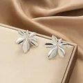 Elegant silver leaf-shaped stainless steel stud earrings on a luxury jewelry box - Six-petal Leaf Style (E1387-B) / 1 Pair Pack / Steel