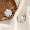 Silver flower shaped stainless steel stud earrings with multi-layered petals - Dotted Texture Flower Style (E1335-B) / 1 Pair Pack / Steel