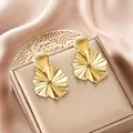 Elegant gold-finished irregular stainless steel shell stud earrings for women - Radiant Shell Flower Style (E1310-A) / 1 Pair Pack / Gold