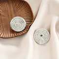 Elegant round silver stainless steel stud earrings with a textured ripple design for women - Silver Wave Relief Style (E1337-B) / 1 Pair Pack / Steel
