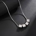 Minimalist titanium steel necklace with five silver cube pendants on a sleek snake chain - Snake Chain / 50+5cm / Steel