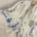 Close-up detail view of a sheer white chiffon scarf with elegant blue floral prints - White Blue Gradient Floral (36#) / 50-150cm
