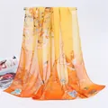 Detail view of a long chiffon scarf with elegant magpie and floral print in orange. - Magpie Spring Style (3#) / 50-150cm / Orange Yellow Gradient