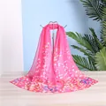 Detailed view of a vibrant pink floral chiffon scarf on a silver display stand. - Floral Print Style (24#) / 50-150cm / Pink