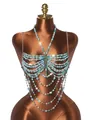 Vista detallada de una cadena de cuerpo con perlas acrílicas turquesas en un maniquí. - Talla única / Tops / Verde azulado