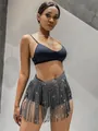 Sparkling rhinestone fringe mini skirt belt worn over black shorts for party wear - S / Black