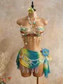 Handmade beaded bohemian halter top with matching sarong on a display mannequin. - XS / Tops / Green