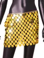 Detailed macro view of a gold sequin disc mini skirt featuring metallic body chain links - One Size / Gold