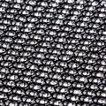 Gros plan macro de strass argentés étincelants sur la texture du tissu résille - Noir