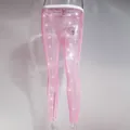 Detail shot of sexy pink mesh pants featuring sparkling rhinestones and a high waist. - One Size / Extra Long Bottom / Pink