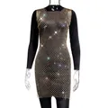 Macro view showing the intricate gold mesh pattern and shimmering rhinestones of the party dress. - XS / Dresses / Gold