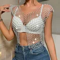 Close-up detail of a sexy silver fishnet rhinestone cropped vest worn on a model - XS / Tops / White