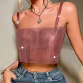 Close-up macro view of sparkly sexy pink rhinestone fishnet crop top for women party wear - Red