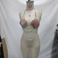 Bohemian seashell bikini top body chain featuring multi-layered white beads on mannequin - One Size / Tops / White