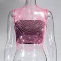 Close-up detail of a pink rhinestone fishnet mesh tank top for sexy clubwear fashion - XS / Top (Round Neck) / Pink