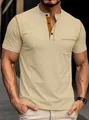 Detalle de polo Henley beige para hombre con costuras naranjas en contraste y bolsillo. - S / Tops / Caqui