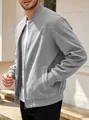 Detailed side view of a men's premium grey faux suede bomber jacket with stand collar. - Blue Gray